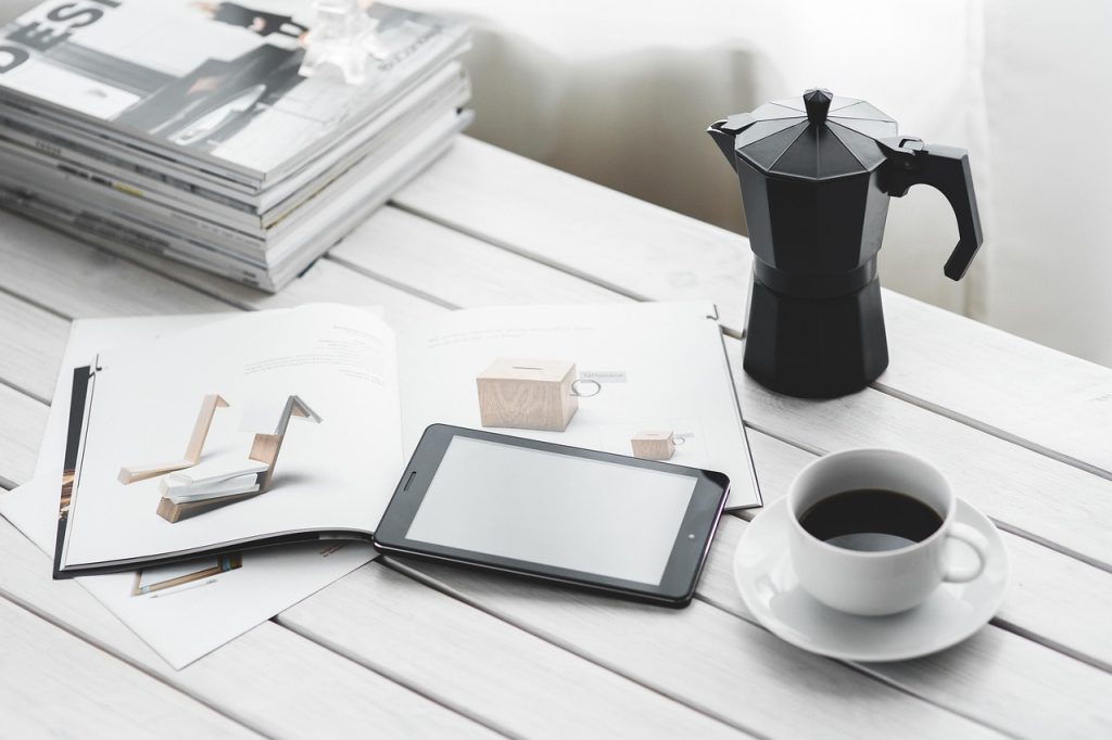 Technology, coffee cup, tablet — Keeping Your Ether Safe: A Guide to Securely Storing Your Ethereum with MyEtherWallet