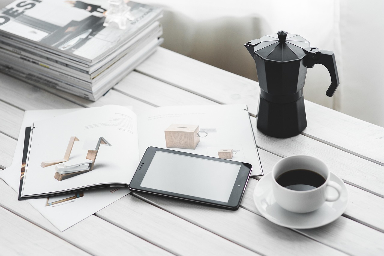 Technology, coffee cup, tablet — Keeping Your Ether Safe: A Guide to Securely Storing Your Ethereum with MyEtherWallet